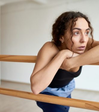 Young Woman at Dance Bar